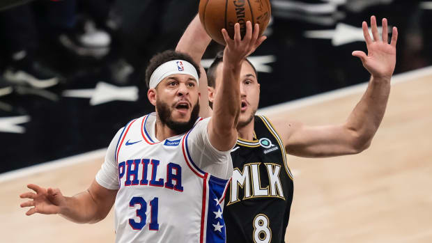 Philadelphia 76ers guard Seth Curry (31) drives to the basket against Atlanta Hawks forward Danilo Gallinari (8) during the first quarter in game six in the second round of the 2021 NBA Playoffs